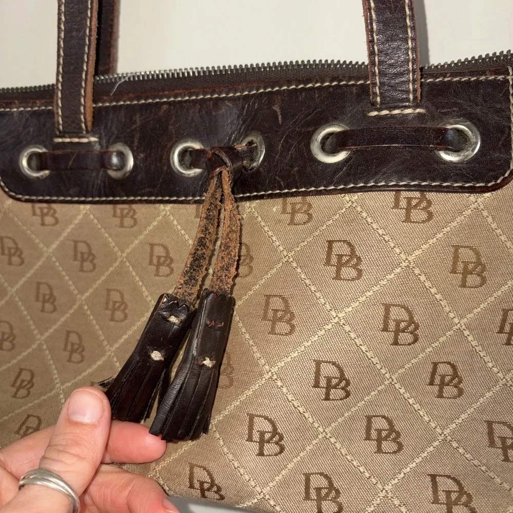 Dooney & Bourke Brown Signature Jacquard Canvas Black Tassel Shoulder Bag